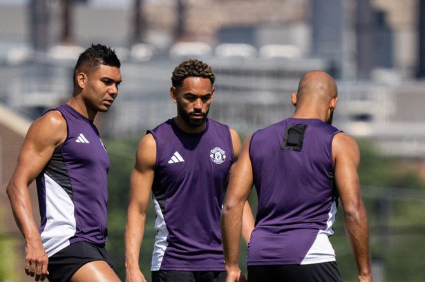 Casemiro, Matheus Cunha  and Bryan Mbeumo of Manchester United in action during a first team training session