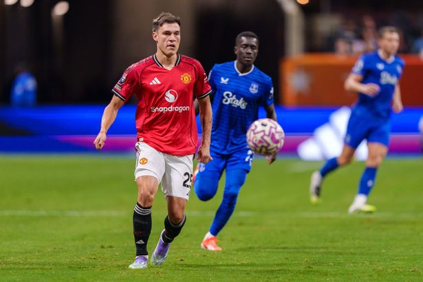 Manuel Ugarte in action for Manchester United against Everton.