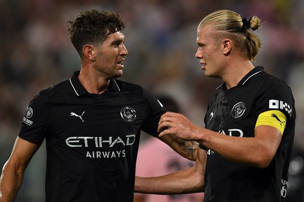 John Stones and Erling Haaland