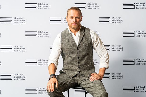 Actor and author Sam Heughan attends a photocall during the 2025 Edinburgh International Book Festival