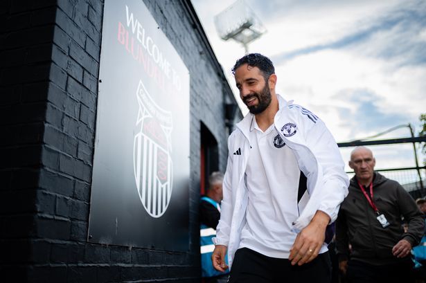 Ruben Amiom smiles as he arrives at Blundell Park.