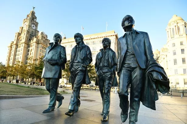 The Beatles statues at the Pier Head.