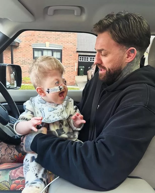 Aaron Chalmers and son