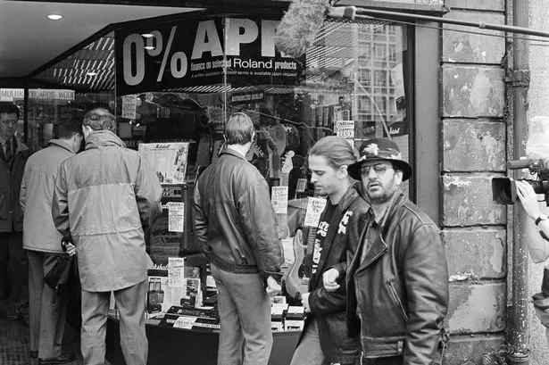 Former Beatles drummer Ringo Starr shows his son Jason some of his old haunts as they strolled down Mathew Street in central Liverpool. 30th September 1992.
