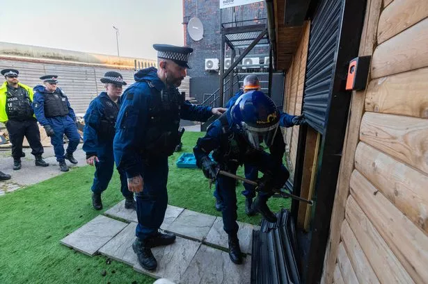 Police carry out a raid in connection with our investigation into counterfeit selling