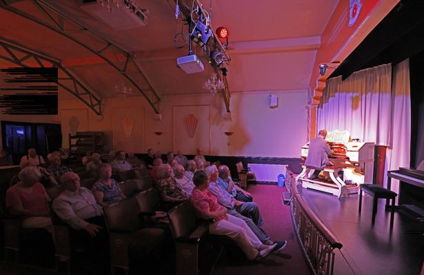 An audience enjoying the mighty Wurlitzer organ at Lancastrian Theatre Organ Trust's 1920s style auditorium in Eccles this week