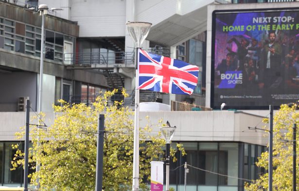 Union Jack flags were put up along Market Street and in Piccadilly Gardens