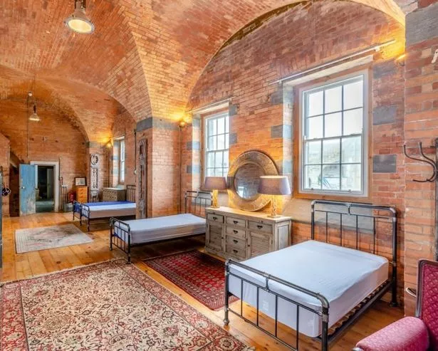 The former soldiers' barracks, where trademen also slept as they worked to save the fort, is now a spacious 'dormitory'