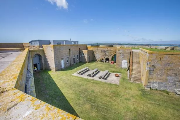 The internal courtyard of Thorne Island fort includes a bespoke built roof terrace are perfect for social gatherings and have seen some parties - with no neighbours to complain about the noise
