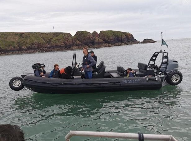 Hugh Dennis arriving at Thorne Island, Pembrokeshire for filming for Channel 4 TV series 'Huge Homes with Hugh Dennis'