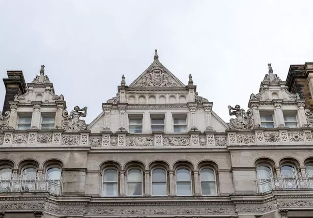  Pineapples on the roof of a building in Castle Street.