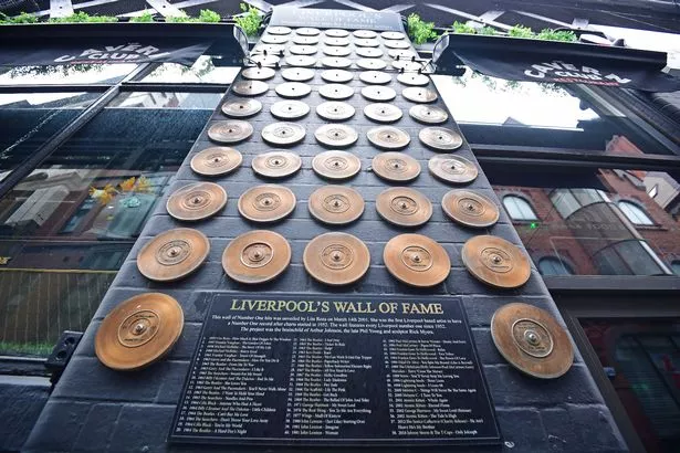 Liverpool's Wall of Fame on Mathew Street. Photo by Colin Lane