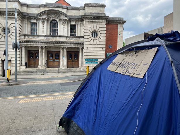Tents were set up on Edward Street outside the offices of Stockport Homes around May.