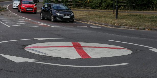 A painted roundabout on the junction of Priory Road, Trittiford Road and Highfield Road in Birmingham