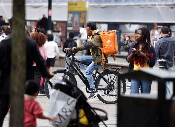 Delivery riders 'criss-cross' through busy parts of the city