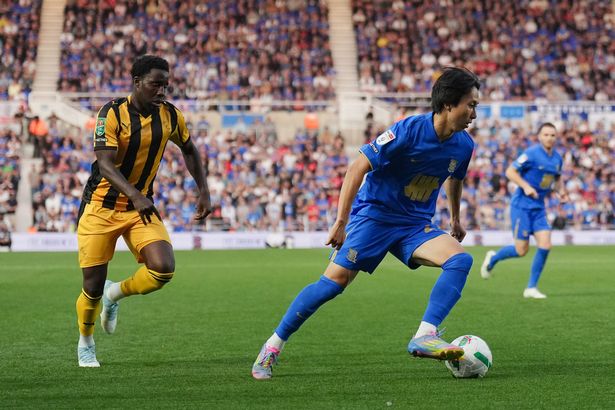 Jaheim Headley of Port Vale and Kanya Fujimoto of Birmingham City