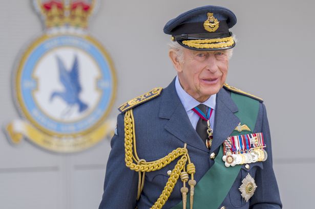 King Charles III during a visit to RAF Lossiemouth in Moray, to re-present the Squadron Standard 
