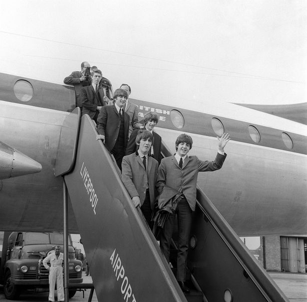 John Lennon, Paul McCartney, George Harrison and Ringo Starr leaving the aircraft at Liverpool Airport for the Northern Premiere of "A Hard Day's Night" in 1964