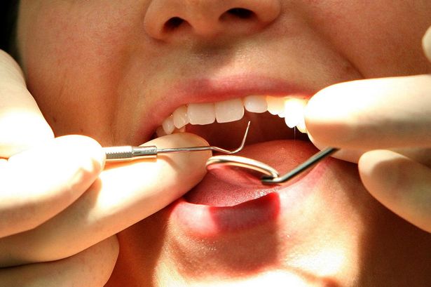 A dentist at work