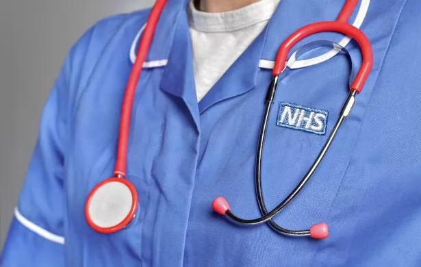 LONDON,ENGLAND - JUNE 6: In this studio shot illustration a NHS uniform close up, with stethoscope on June 6,2019 in London,England.