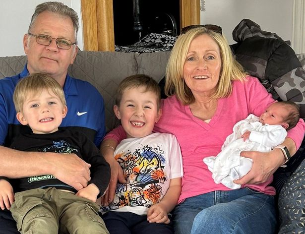 Nikki and Michael with their grandchildren