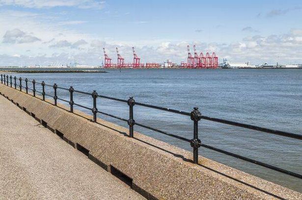 Overlooking the railings on the promenade at New Brighton
