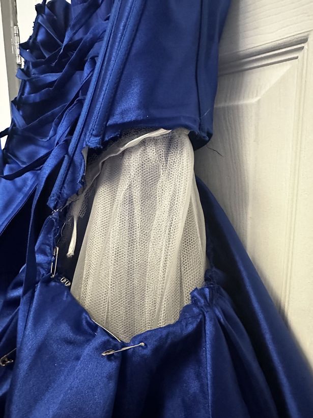 Her beloved dress was 'torn to pieces'