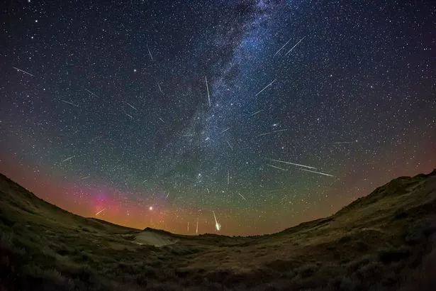 A composite showing about three dozen Perseid meteors over Dinosaur Provincial Park, Alberta, Canada.