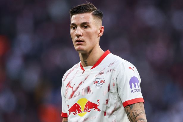 Benjamin Sesko looks on during an RB Leipzig match