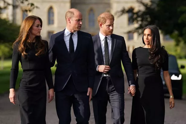 Britain's Catherine, Princess of Wales, Britain's Prince William, Prince of Wales, Britain's Prince Harry, Duke of Sussex, and Meghan, Duchess of Sussex on the long Walk at Windsor Castle on September 10, 2022