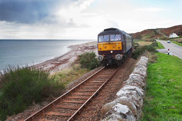Royal Scotsman train on Scottish coastline