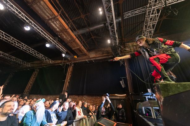 A picture of Eugene Hütz of Gogol Bordello performing on stage at SWG3