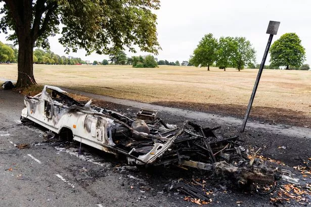 The caravan was 'deliberately' set ablaze on Clifton Downs in Bristol - where dozens of people live in more than 100 vans