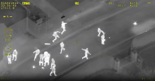 Yobs throw bricks, bottles and fireworks at the police in Edinburgh
