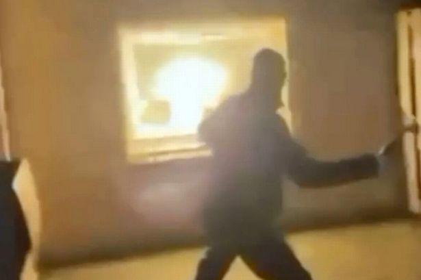 Grab of a gang  member firebombing a home