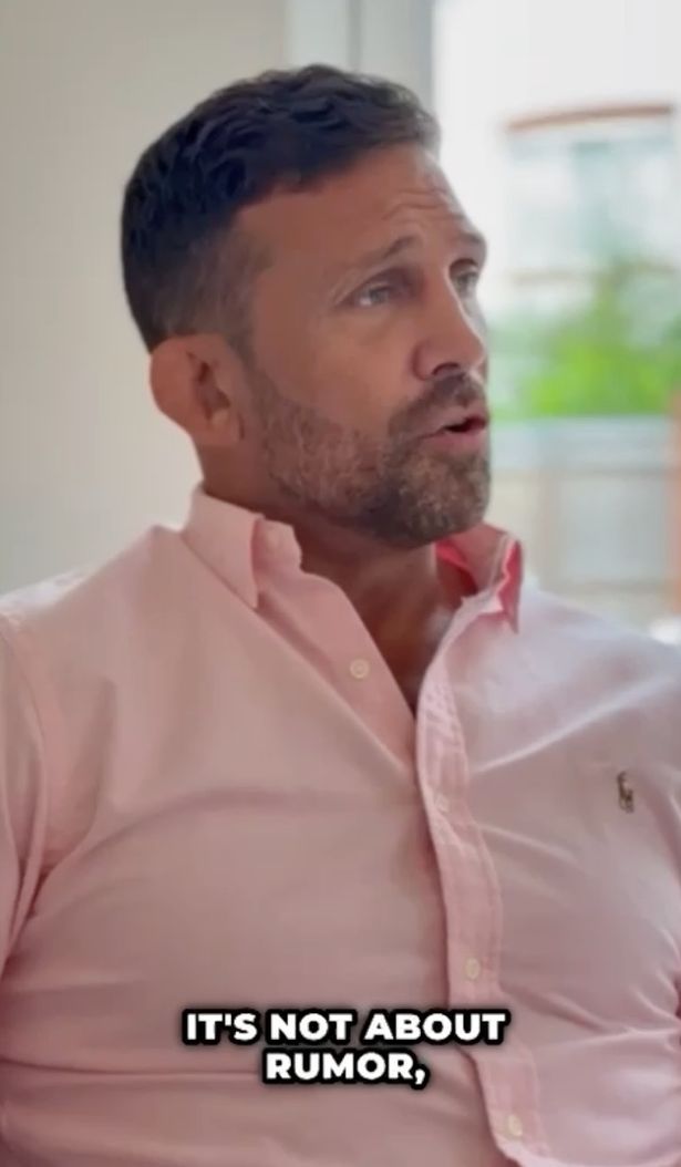Alex Reid video still - man wearing pink button-up shirt