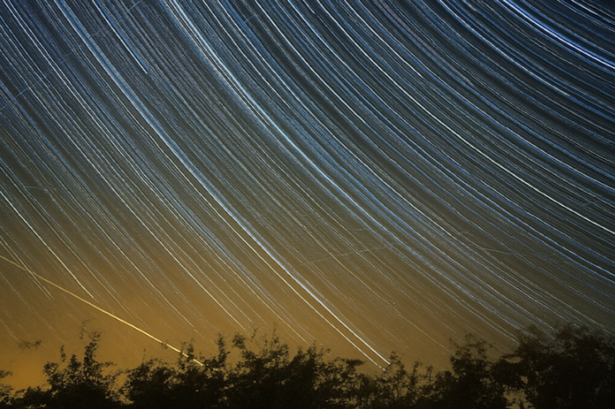 Perseid meteor streaks across the night sky above Magor and Undy in Wales