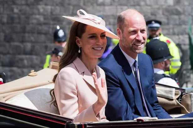 Catherine, Princess of Wales and William, Prince of Wales travel in a carriage towards Windsor Castle during the state visit 
