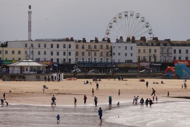 Members of the public enjoy the beach on April 06, 2024 