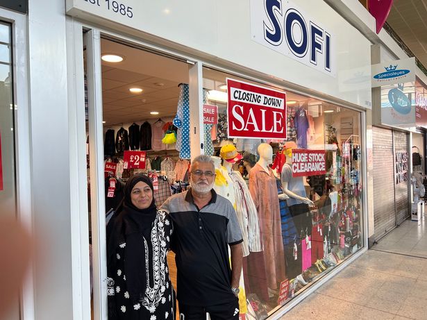 Sofi and Yusuf Patel outside their shop in Stretford Mall, which is soon to close