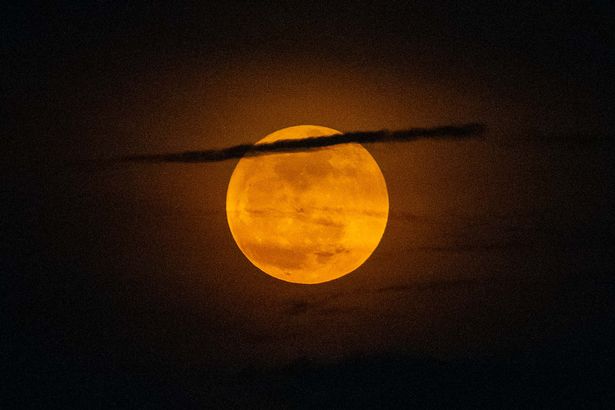The sturgeon supermoon rises in Kuala Lumpur, Malaysia, on August 9, 2025. (Photo by Mohd Firdaus/NurPhoto via Getty Images)