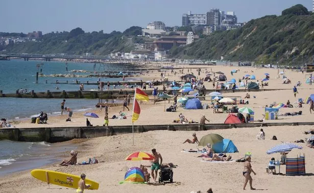 Stock image of people at the beach