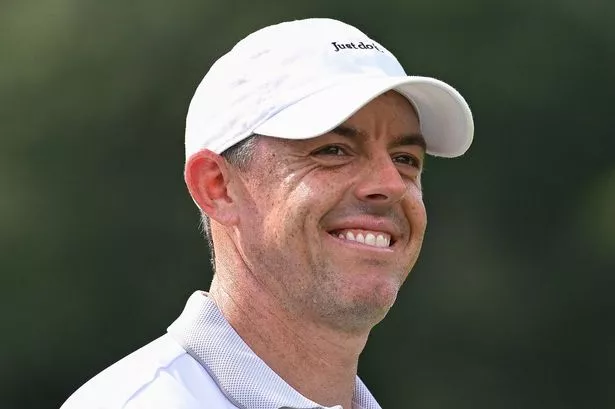 Rory McIlroy of Northern Ireland walks off the 11th tee box during the first round of the TOUR Championship at East Lake Golf Club
