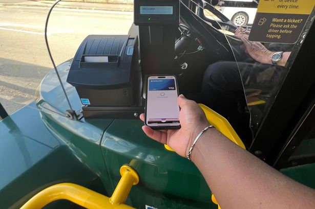 A bus fare paid for by contactless payment on a phone
