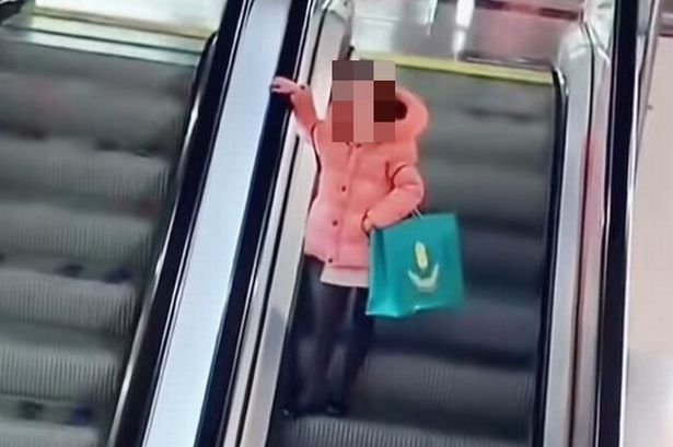 'Pink hair girl' has become a viral trend on TikTok thanks to a series of clips filmed at the Manchester Arndale