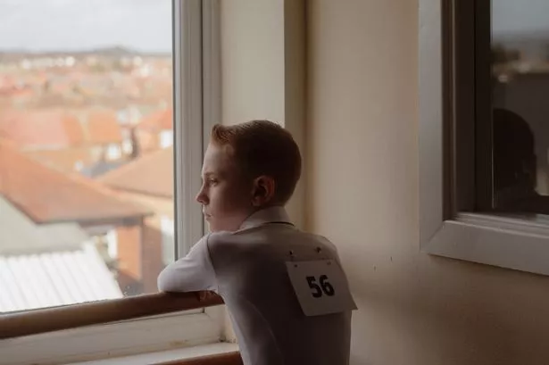 Portrait of young dancer, Abe, looking over the West End of Newcastle