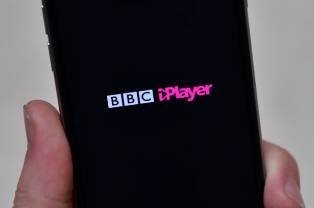In this photo illustration, the BBC iPlayer app is displayed on an iPhone 