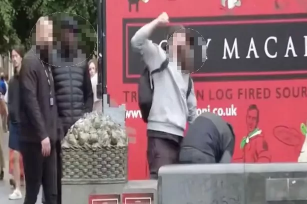 The brawl erupted in front of the performer. 