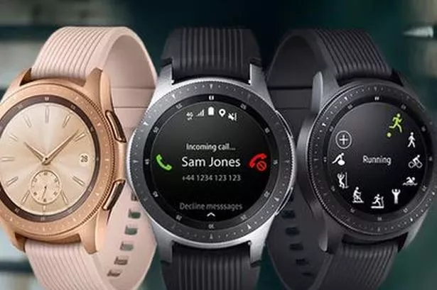 Three Samsung Galaxy smart watches in different colours
