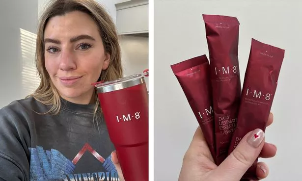 Laura holding IM8 drink